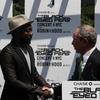 Mayor Bloomberg and the Black Eyed Peas' will.i.am shake hands on the roof of  the parks building on 5th Avenue.